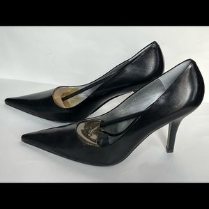 New and unworn black pumps.